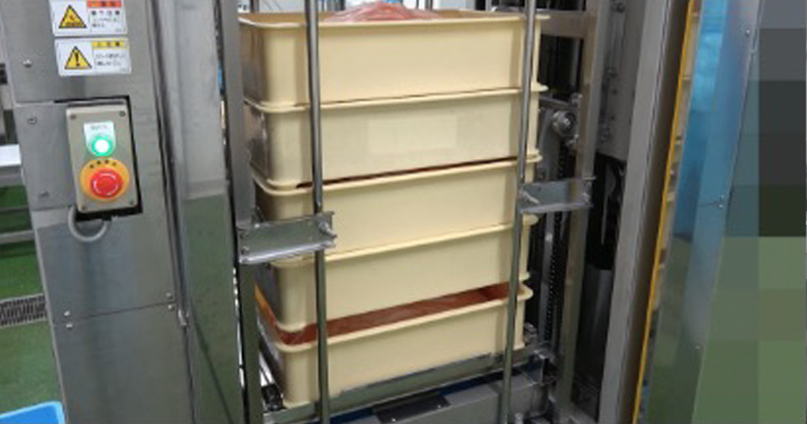 シャリ入り番重段積み装置写真